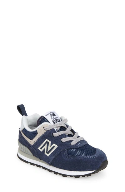 Shop New Balance Kids' 574 Sneaker In Navy/ White