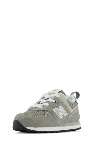 Shop New Balance Kids' 574 Sneaker In Grey/ White