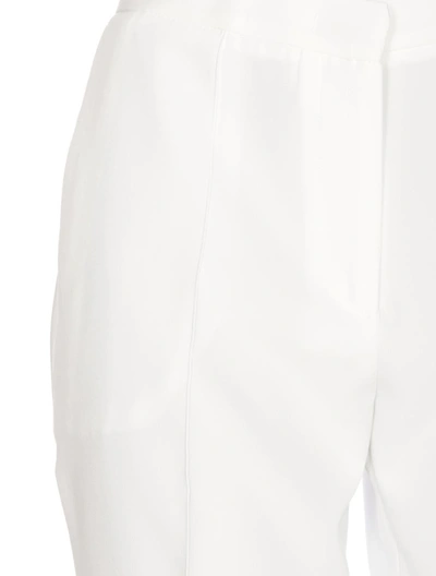 Shop Hinnominate Trousers In White
