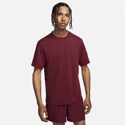 Shop Nike Men's Primary Dri-fit Short-sleeve Versatile Top In Red