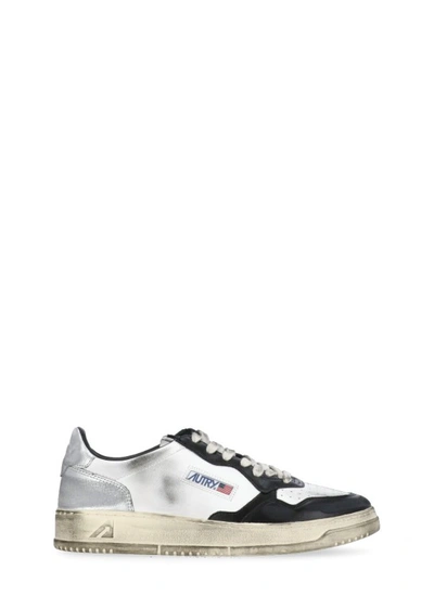 Shop Autry Vintage Sneakers In White
