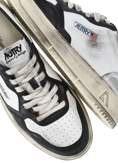 Shop Autry Vintage Sneakers In White