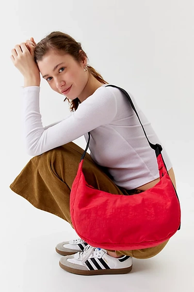 Shop Baggu Medium Nylon Crescent Bag In Candy Apple At Urban Outfitters