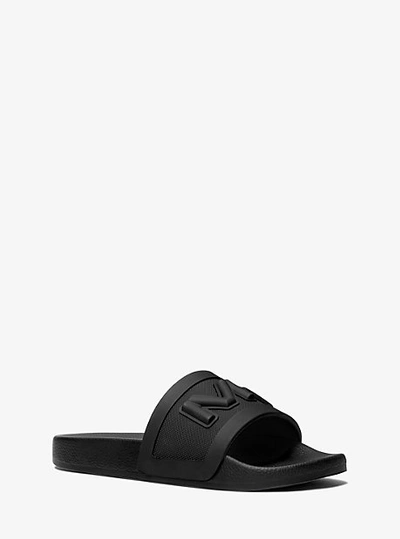 Shop Michael Kors Jake Logo Embossed Rubber Slide Sandal In Black