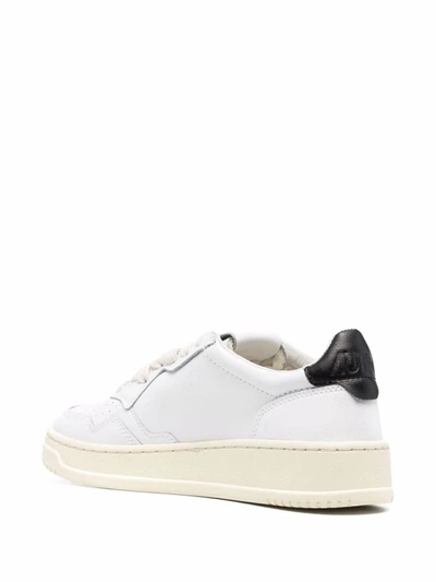 Shop Autry Logo-patch Low-top Sneakers In Wht/black