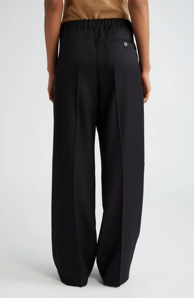 Acne Studios Pernille Herringbone Jacquard Pleated Wide Leg Trousers In Black