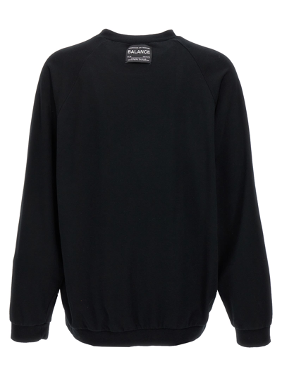 Shop Undercover Chaos And Balance Sweatshirt In Black