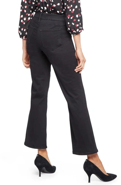 Shop Nydj Waist Match Relaxed Flare Jeans In Black Rinse