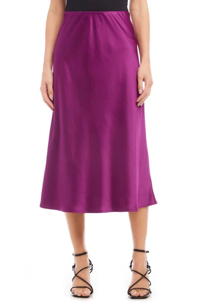 Shop Karen Kane Bias Cut Satin Midi Skirt In Magenta