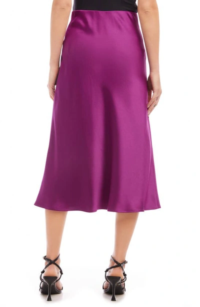 Shop Karen Kane Bias Cut Satin Midi Skirt In Magenta
