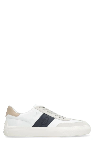 Shop Tod's Sneakers In White