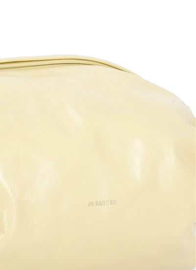 Shop Jil Sander Cushion Shoulder Bag In Yellow