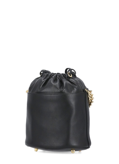 Shop Moschino Bucket Bag With Logo In Black