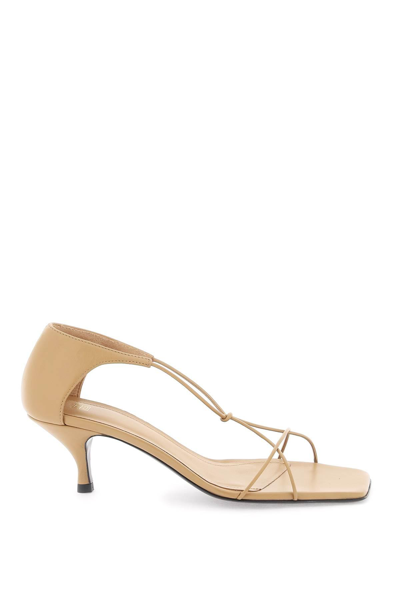 Shop Totême Leather Knot Sandals With In Beige