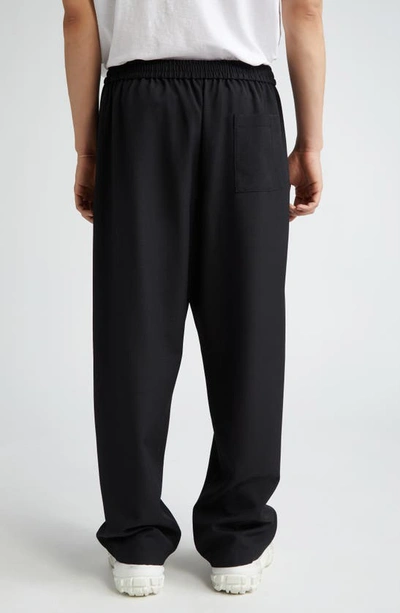 Shop Acne Studios Relaxed Wide Leg Pants In Black