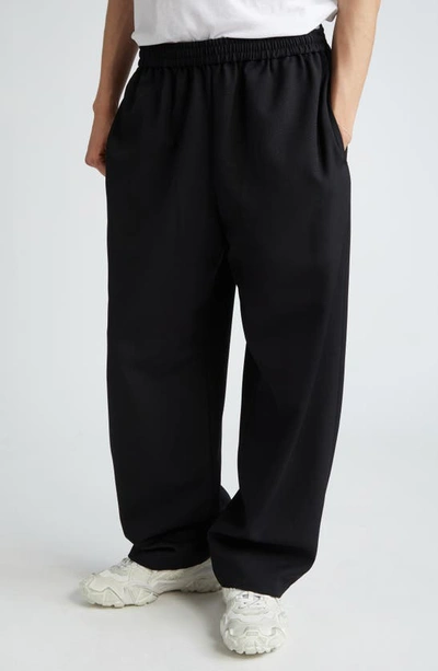 Shop Acne Studios Relaxed Wide Leg Pants In Black