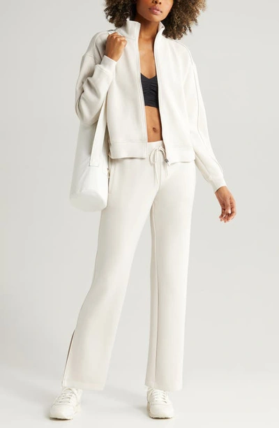 Zella Level Set Straight Leg Slit Hem Track Pants In Grey Moonbeam