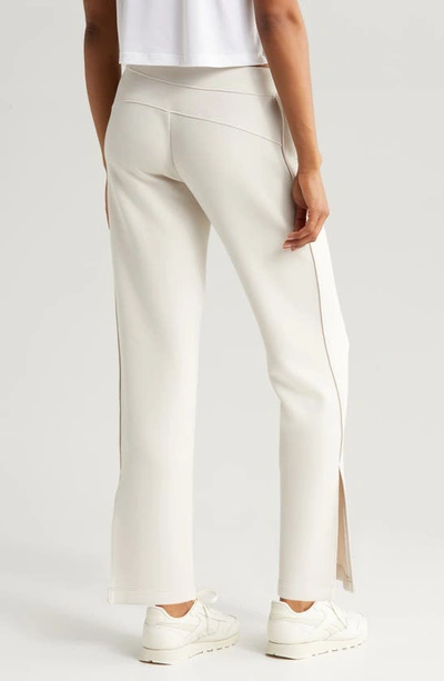 Zella Level Set Straight Leg Slit Hem Track Pants In Grey Moonbeam