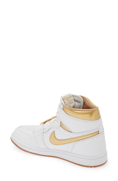 Shop Jordan Air  1 Retro High Basketball Sneaker In White/ Gold Gum Light Brown