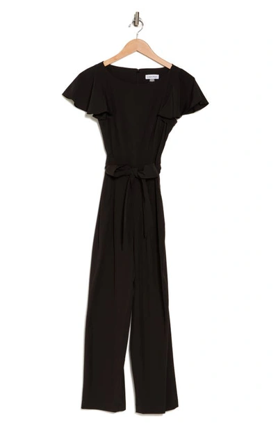 Shop Calvin Klein Comm Tie Waist Jumpsuit In Black