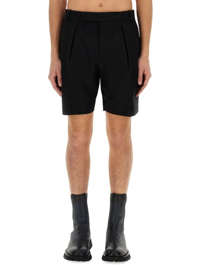 Shop Alexander Mcqueen Cotton Bermuda Shorts In Black