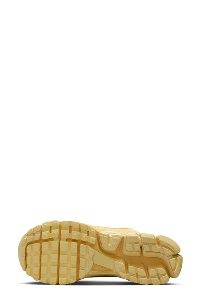 Shop Nike Zoom Vomero 5 Sneaker In Saturn Gold/ Lemon Wash