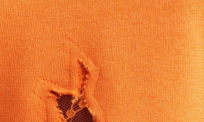 Shop Monse Lace Hem Crop Mock Neck Sweater In Orange