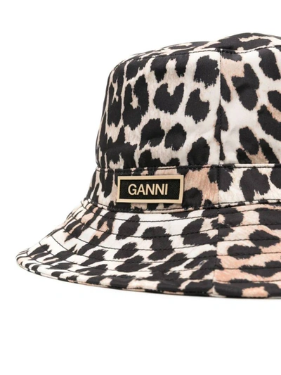 Shop Ganni Hats In Brown
