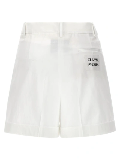 Shop Moschino 'classic' Shorts In White