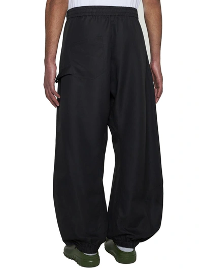 Shop Jw Anderson Trousers In Black