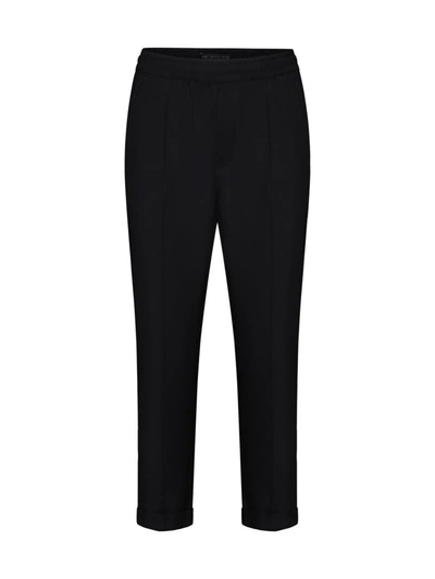 Shop Low Brand Trousers In Jet Black