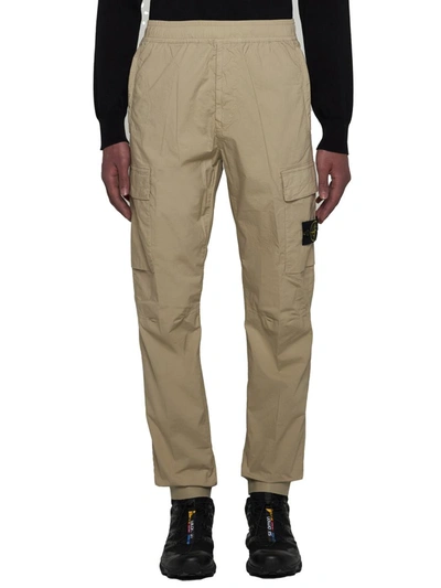 Shop Stone Island Trousers In Sand