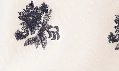 Cece Floral Embroidered Ruffle Cuff Georgette Top In New Ivory