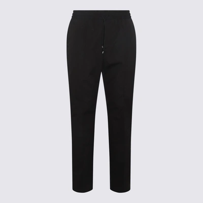 Shop Valentino Trousers Black