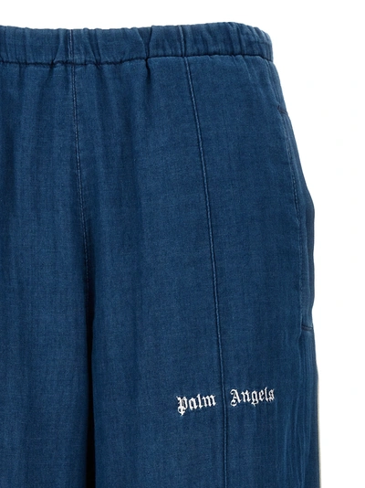 Shop Palm Angels Track Pants Blue