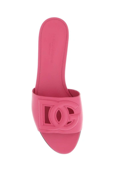 Shop Dolce & Gabbana Leather Slides With Cut-out Logo In Fuchsia