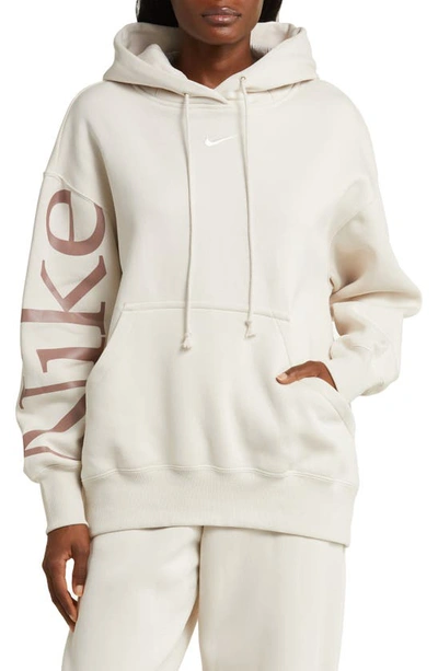 Shop Nike Sportswear Phoenix Fleece Oversize Longline Hoodie In Lt Orewood Brn/ Sail