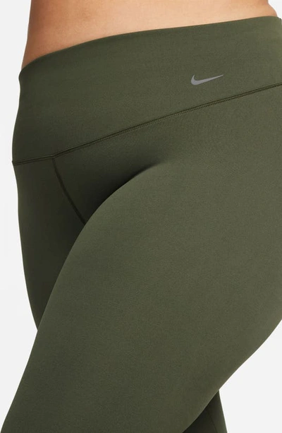 Shop Nike Zenvy Gentle Support High Waist 7/8 Leggings In Cargo Khaki/ Black