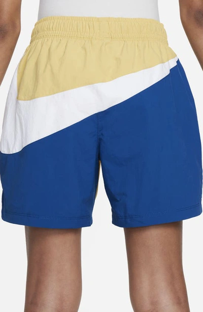 Shop Nike Kids' Amplify Nylon Athletic Shorts In Saturn Gold/ Court Blue/ White
