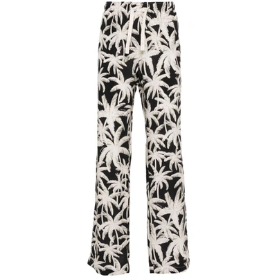 Shop Palm Angels Pants In White/black