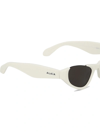 Shop Alaïa Cat-eye Sunglasses In White