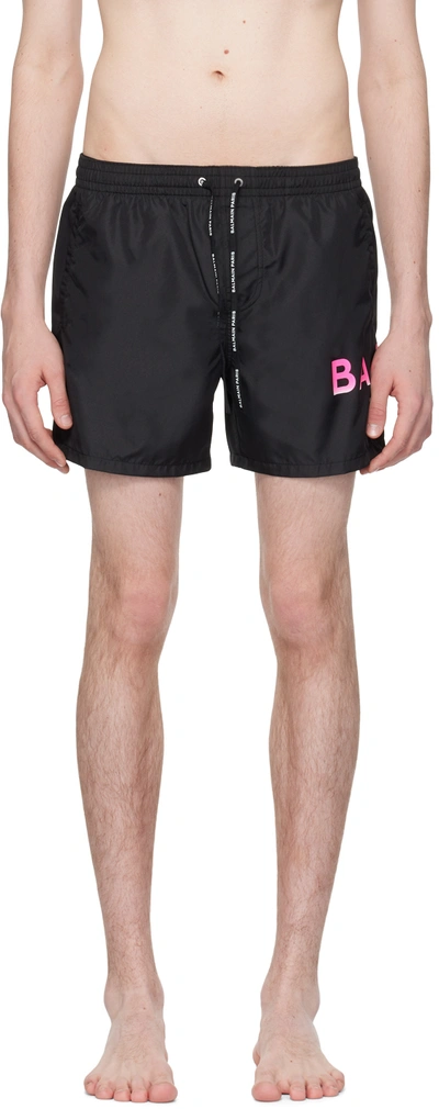 Shop Balmain Black Printed Swim Shorts In 006 Black/fluo Pink