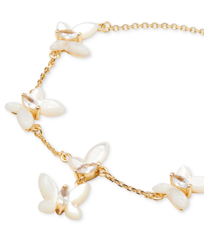Shop Kate Spade Gold-tone Cubic Zirconia & Mother-of-pearl Butterfly Link Bracelet In White Multi