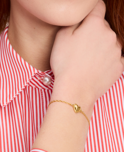 Shop Kate Spade Gold-tone Twisted Frame Heart Link Bracelet In Gold.