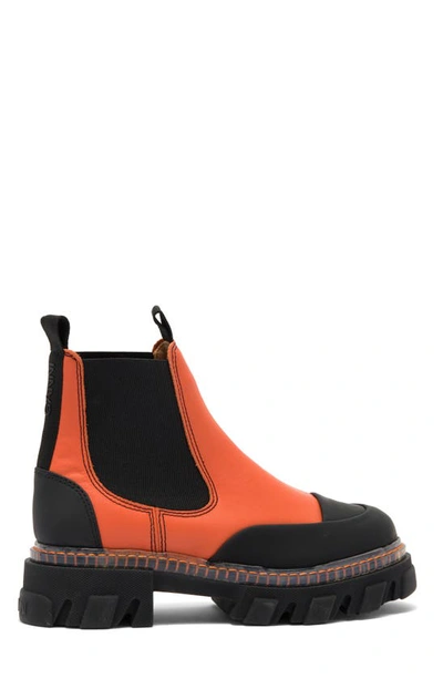 Shop Ganni Cleated Low Cheslea Boot In Orangeade