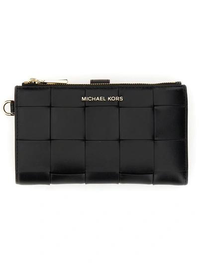 Shop Michael Michael Kors Michael Kors Braided Leather Wallet In Black