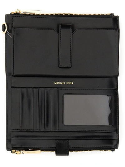 Shop Michael Michael Kors Michael Kors Braided Leather Wallet In Black