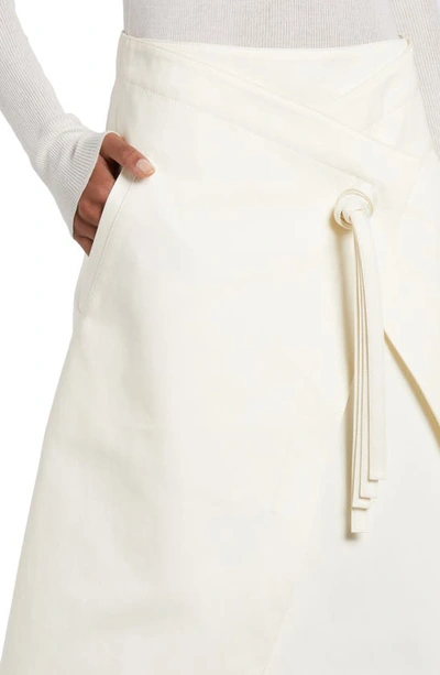 Shop Bottega Veneta Knot Detail Cotton Twill Faux Wrap Skirt In Dove