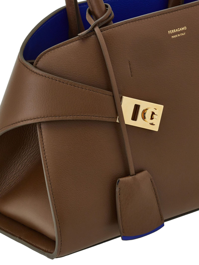 Shop Ferragamo Brown Hug Handbag (s) In Marrone