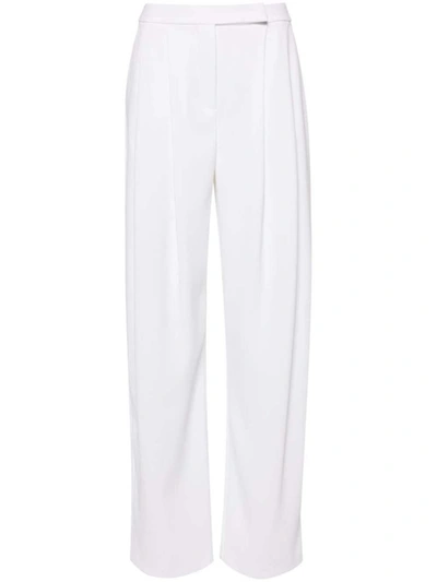 Shop Pinko Trousers White